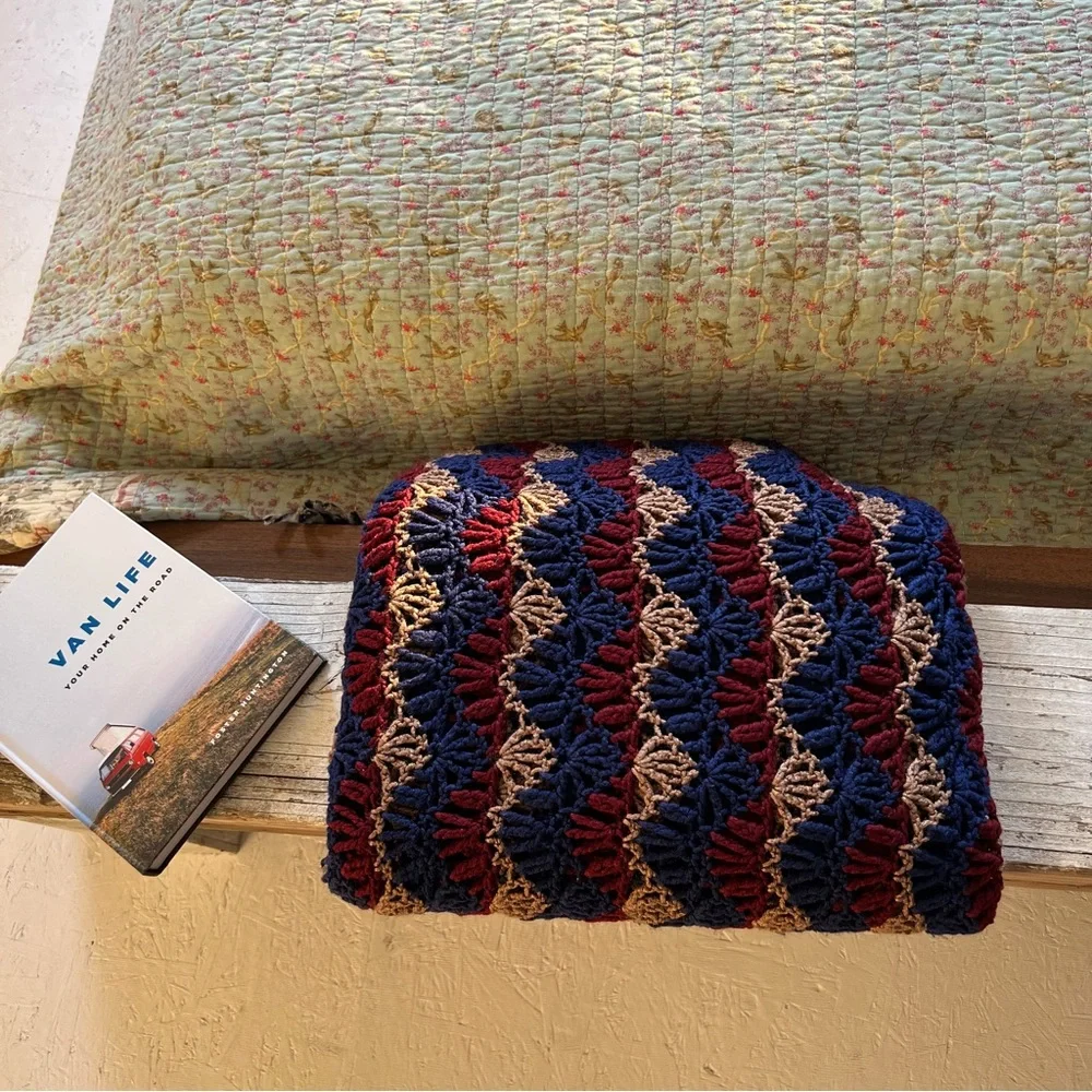 Vintage handmade loose open knit tan red blue throw blanket